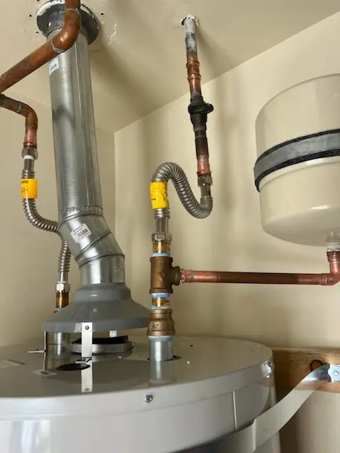 Water heater installation and plumbing repair in Hector Campbell